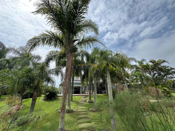 Imagem Casa com 5 Quartos à Venda, 430 m² em Condominio Atlantida Ilhas Park - Xangri-lá Imagem Casa com 5 Quartos à Venda, 430 m² em Condominio Atlantida Ilhas Park - Xangri-lá