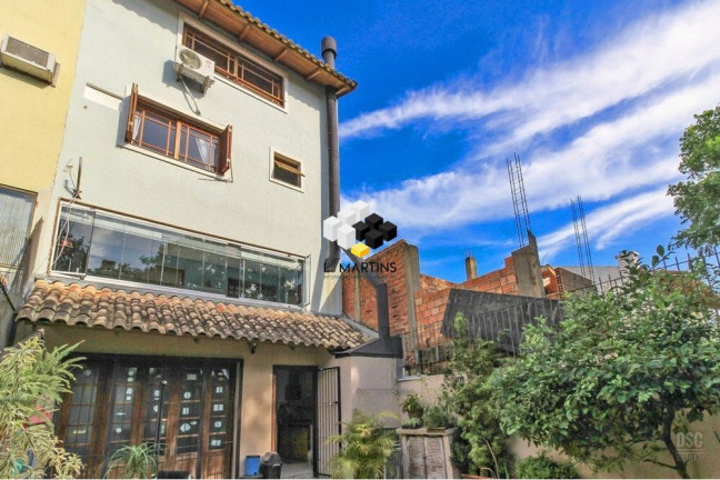 Imagem Casa com 3 Quartos à Venda, 231 m² em Ipanema - Porto Alegre