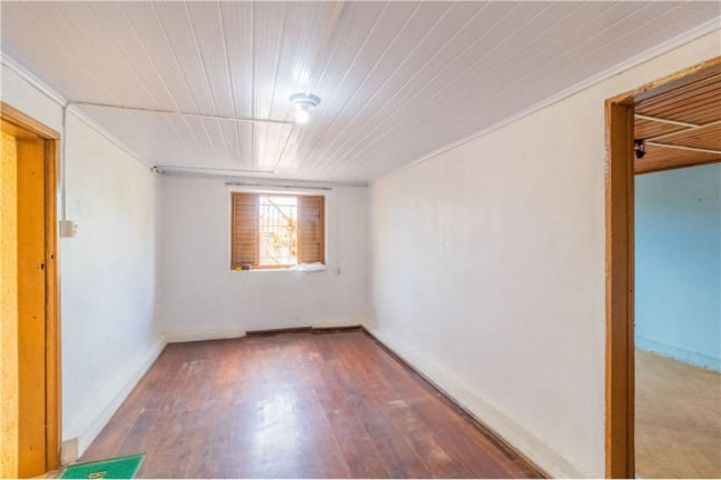 Imagem Casa com 5 Quartos à Venda,  em Partenon - Porto Alegre