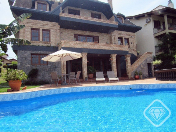 Imagem Casa de Condomínio com 4 Quartos à Venda, 550 m² em Cavalhada - Porto Alegre