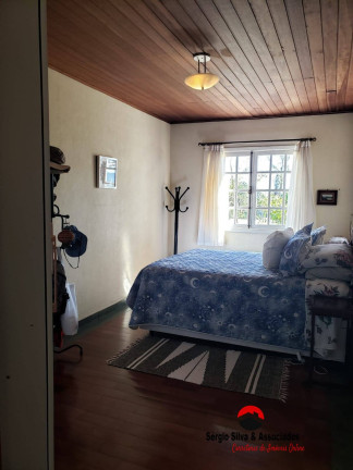 Imagem Casa com 7 Quartos à Venda, 1 m² em Vila Porã - Campos Do Jordão