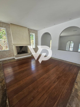 Imagem Casa de Condomínio com 4 Quartos à Venda, 630 m² em Alphaville - Barueri
