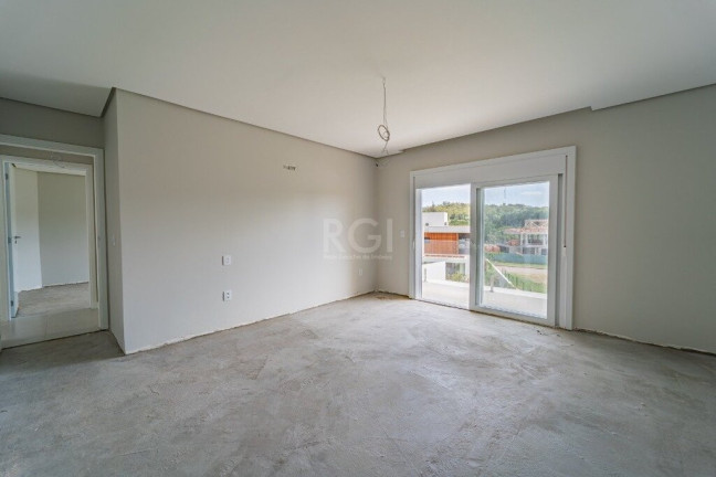 Imagem Casa de Condomínio com 3 Quartos à Venda, 300 m² em Vila Nova - Porto Alegre