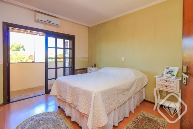 Imagem Casa com 3 Quartos à Venda, 198 m² em Cavalhada - Porto Alegre