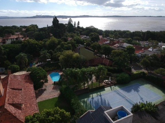 Imagem Casa com 5 Quartos à Venda, 418 m² em Tristeza - Porto Alegre