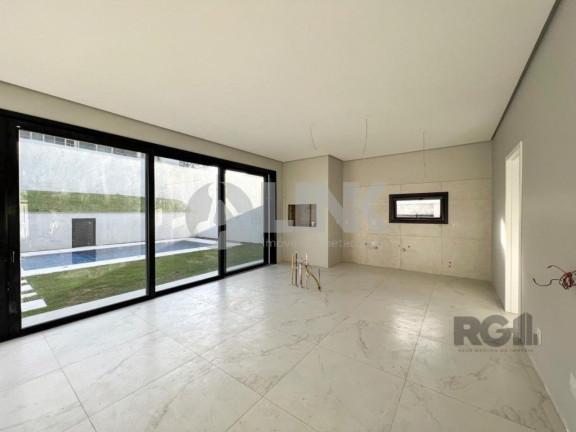 Imagem Imóvel com 4 Quartos à Venda, 371 m² em Vila Nova - Porto Alegre