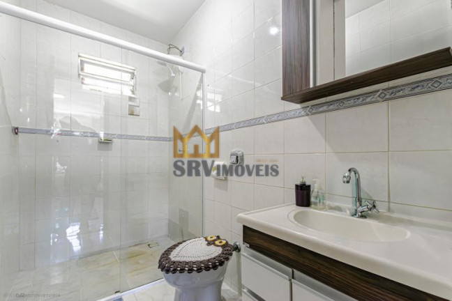 Imagem Sobrado com 3 Quartos à Venda, 129 m² em Santa Cândida - Curitiba