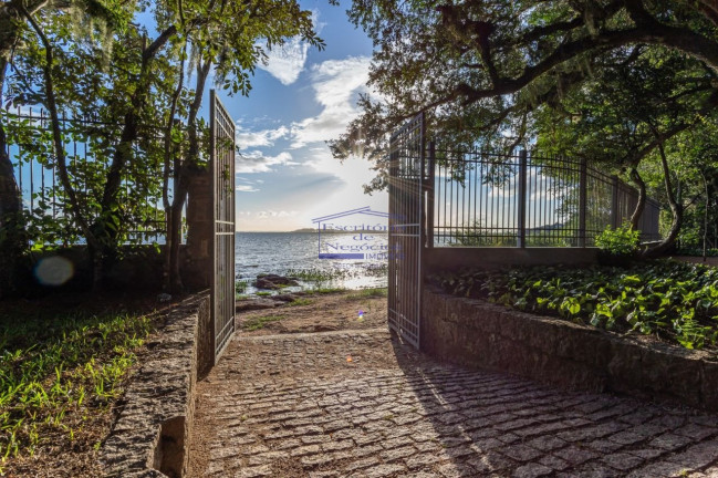 Imagem Casa com 3 Quartos à Venda, 344 m² em Pedra Redonda - Porto Alegre