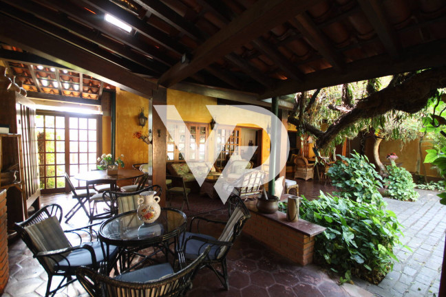 Imagem Casa de Condomínio com 5 Quartos à Venda, 700 m² em Alphaville - Barueri