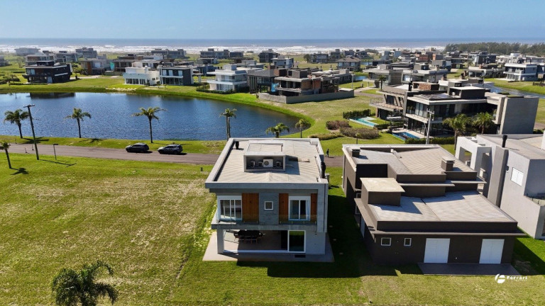 Imagem Casa de Condomínio com 4 Quartos à Venda, 250 m² em Capão Novo - Capão Da Canoa