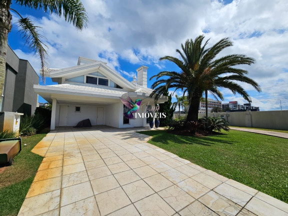 Imagem Casa de Condomínio com 4 Quartos à Venda, 327 m² em Centro - Xangri-lá