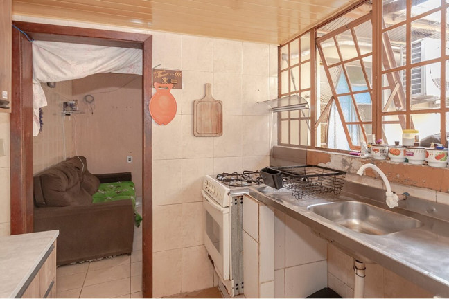 Imagem Casa com 4 Quartos à Venda, 170 m² em Vila Nova - Porto Alegre