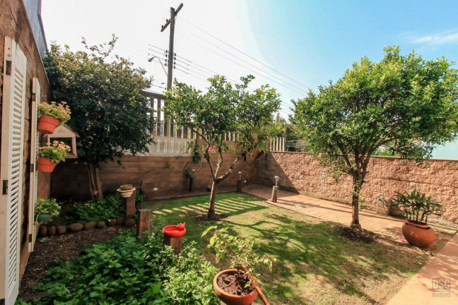 Imagem Casa de Condomínio com 3 Quartos à Venda, 205 m² em Vila Nova - Porto Alegre