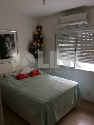 Imagem Apartamento com 3 Quartos à Venda, 65 m² em Santo Antônio - Porto Alegre Imagem Apartamento com 3 Quartos à Venda, 65 m² em Santo Antônio - Porto Alegre