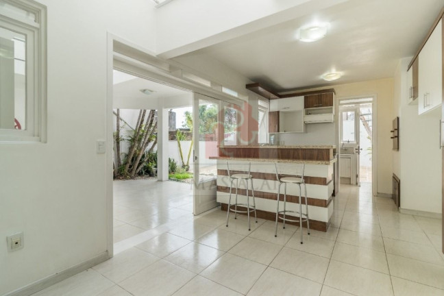 Imagem Casa com 4 Quartos à Venda, 250 m² em Menino Deus - Porto Alegre