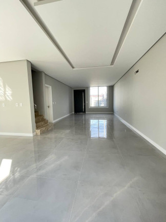 Imagem Sobrado com 3 Quartos à Venda, 220 m² em Moinhos De Vento - Canoas