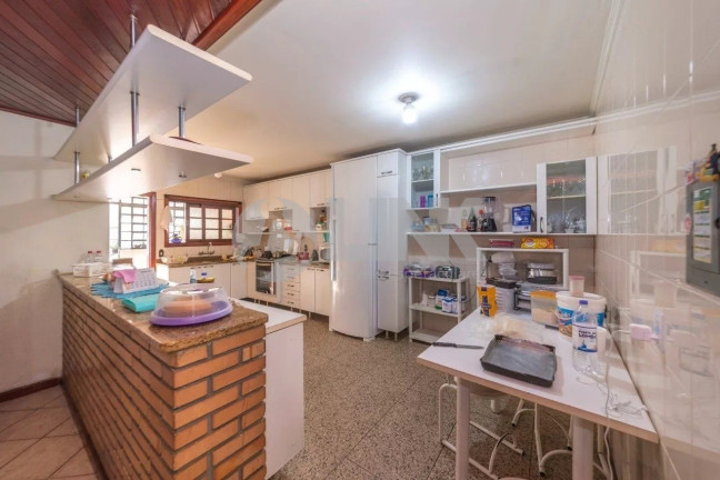 Imagem Casa com 3 Quartos à Venda, 262 m² em Auxiliadora - Porto Alegre Imagem Casa com 3 Quartos à Venda, 262 m² em Auxiliadora - Porto Alegre