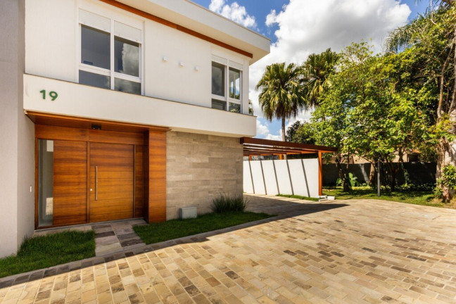Imagem Casa de Condomínio com 3 Quartos à Venda, 211 m² em Teresópolis - Porto Alegre