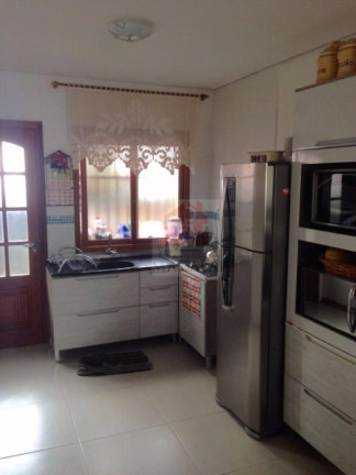 Imagem Casa com 3 Quartos à Venda, 130 m² em Vila Nova - Porto Alegre