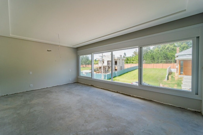 Imagem Casa de Condomínio com 3 Quartos à Venda, 300 m² em Vila Nova - Porto Alegre