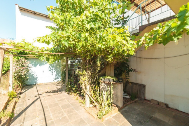 Imagem Casa com 3 Quartos à Venda, 195 m² em Santa Maria Goretti - Porto Alegre Imagem Casa com 3 Quartos à Venda, 195 m² em Santa Maria Goretti - Porto Alegre