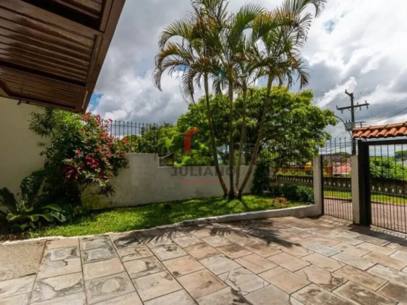 Imagem Casa com 4 Quartos à Venda, 280 m² em Vila Jardim - Porto Alegre
