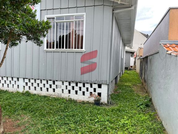 Imagem Casa com 5 Quartos à Venda, 200 m² em Bacacheri - Curitiba