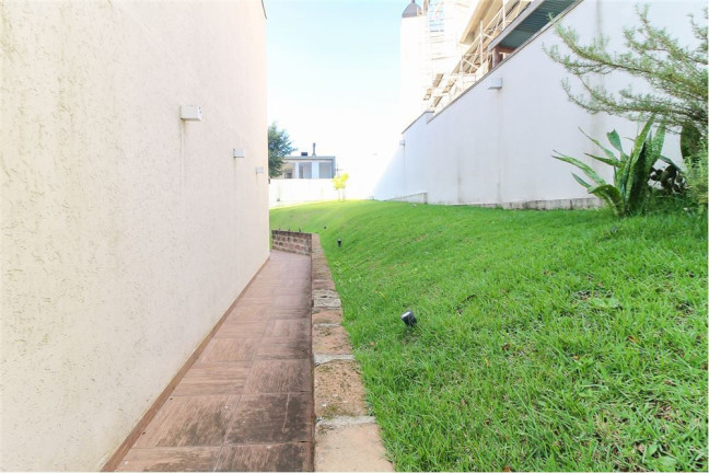 Imagem Casa com 4 Quartos à Venda, em Vila Nova - Porto Alegre Imagem Casa com 4 Quartos à Venda, em Vila Nova - Porto Alegre
