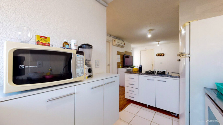 Imagem Imóvel com 2 Quartos à Venda, 48 m² em Vila Nova - Porto Alegre Imagem Imóvel com 2 Quartos à Venda, 48 m² em Vila Nova - Porto Alegre