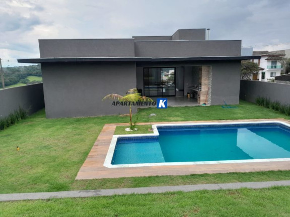 Imagem Casa de Condomínio com 4 Quartos à Venda, 257 m²