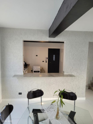 Imagem Casa com 4 Quartos à Venda, 247 m² em Jardim Virgínia - Guarujá