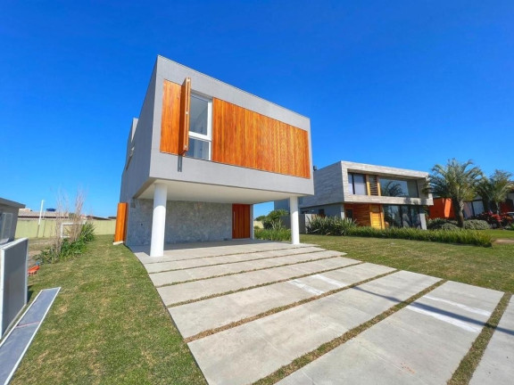 Imagem Casa de Condomínio com 4 Quartos à Venda, 341 m² em Centro - Xangri-lá