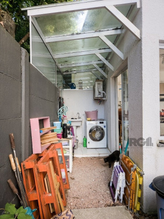 Imagem Casa com 4 Quartos à Venda, em Vila Nova - Porto Alegre Imagem Casa com 4 Quartos à Venda, em Vila Nova - Porto Alegre
