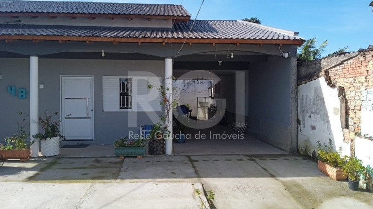 Imagem Casa com 3 Quartos à Venda, 360 m² em Maria Regina - Alvorada Imagem Casa com 3 Quartos à Venda, 360 m² em Maria Regina - Alvorada