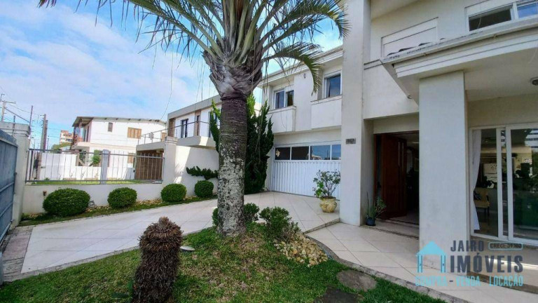 Imagem Sobrado com 3 Quartos à Venda, 240 m² em Centro - Tramandaí Imagem Sobrado com 3 Quartos à Venda, 240 m² em Centro - Tramandaí