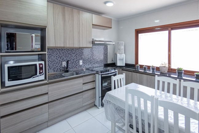 Imagem Casa com 2 Quartos à Venda, 94 m² em Rubem Berta - Porto Alegre
