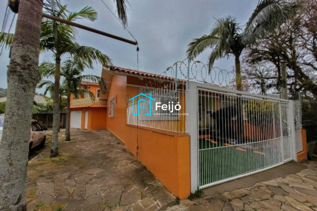 Imagem Casa com 3 Quartos à Venda, 197 m² em Teresópolis - Porto Alegre Imagem Casa com 3 Quartos à Venda, 197 m² em Teresópolis - Porto Alegre