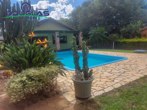 Imagem Casa com 5 Quartos à Venda, em águas Claras - Viamão Imagem Casa com 5 Quartos à Venda, em águas Claras - Viamão