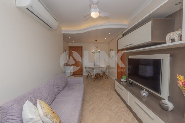 Imagem Apartamento com 2 Quartos à Venda, 60 m² em Passo Da Areia - Porto Alegre