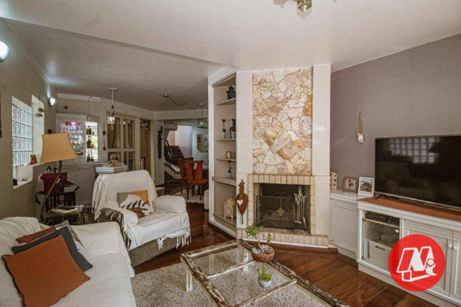 Imagem Casa com 3 Quartos à Venda, 306 m² em Santo Antônio - Porto Alegre