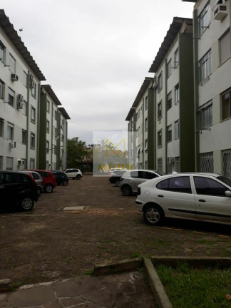Imagem Apartamento com 2 Quartos à Venda, 52 m² em Vila Nova - Porto Alegre