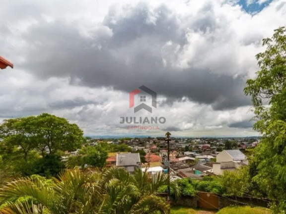 Imagem Casa com 4 Quartos à Venda, 280 m² em Vila Jardim - Porto Alegre