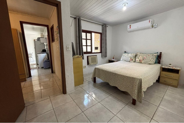 Imagem Casa com 2 Quartos à Venda, 98 m² em Guajuviras - Canoas