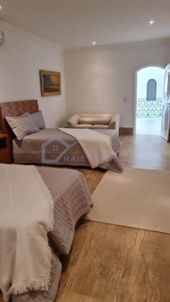 Imagem Sobrado com 7 Quartos à Venda,  em Jardim Acapulco - Guarujá