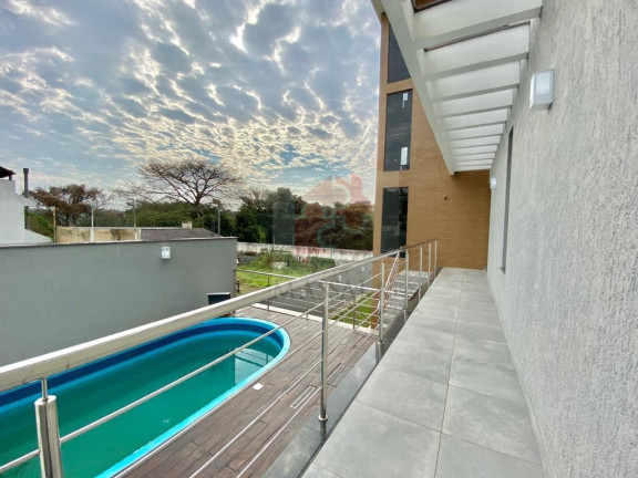 Imagem Casa com 4 Quartos à Venda, 598 m² em Espírito Santo - Porto Alegre Imagem Casa com 4 Quartos à Venda, 598 m² em Espírito Santo - Porto Alegre