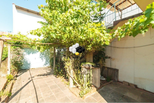 Imagem Casa com 3 Quartos à Venda, 195 m² em Santa Maria Goretti - Porto Alegre Imagem Casa com 3 Quartos à Venda, 195 m² em Santa Maria Goretti - Porto Alegre