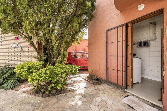 Imagem Casa com 3 Quartos à Venda, 219 m² em Cavalhada - Porto Alegre