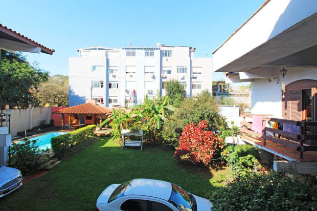 Imagem Casa com 4 Quartos à Venda, 458 m² em Partenon - Porto Alegre Imagem Casa com 4 Quartos à Venda, 458 m² em Partenon - Porto Alegre