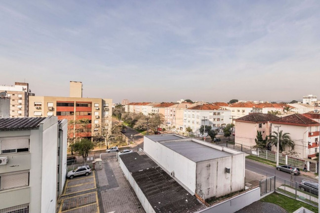 Imagem Imóvel com 2 Quartos à Venda, 53 m² em Jardim Lindóia - Porto Alegre