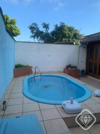 Imagem Casa de Condomínio com 4 Quartos à Venda,  em Ipanema - Porto Alegre
